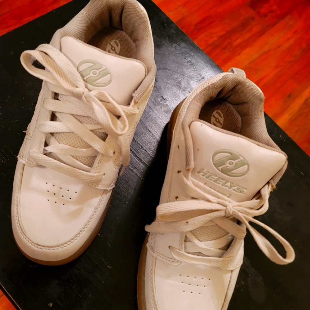 Heelys white size 6 youth good condition .